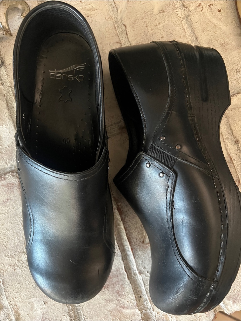 Dansko Black Leather Women's Slip-On Clogs